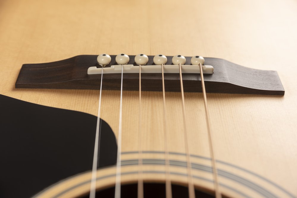 ¿Qué tensión deben tener las cuerdas de la guitarra?