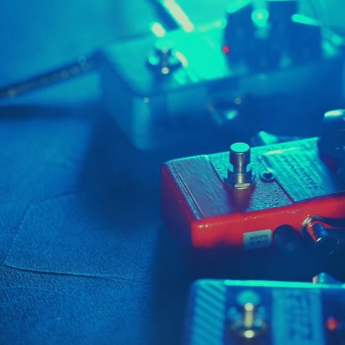 Close up of guitar pedals. music effect loop machine. Macro view.